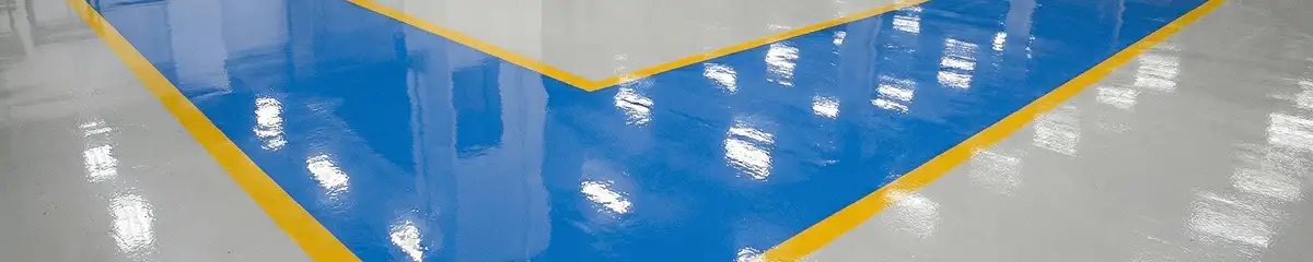A factory floor professionally covered and marked with epoxy flooring in Salt Lake City, UT