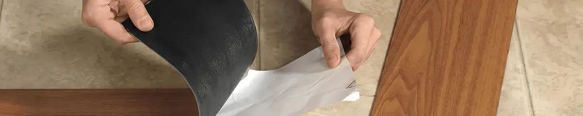 A professional installing vinyl flooring in Salt Lake City, UT
