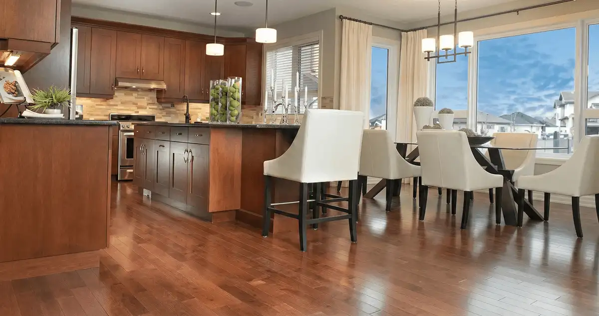 A modern kitchen with professionally installed wood flooring in Salt Lake City, UT